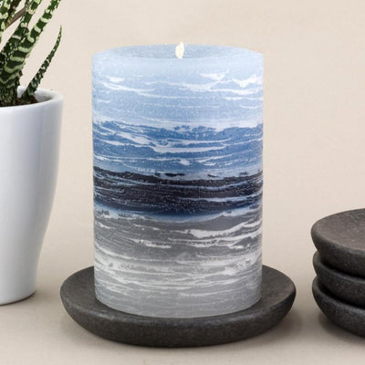 light blue to dark blue to gray shades in 3x4" candle by Nordic Candle