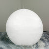 White Candle Rustic Disc 5.75 inches wide 2.35 deep and 5.5 inches tall artisan handmade by Nordic Candle